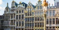 Vintage Street Lamp In Front Of Guild Houses Facades On The Grand Place Of Brussels, Belgium