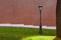Vintage street lamp on red brick wall background Royalty Free Stock Photo
