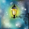 Vintage street lamp with shiny background
