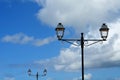 Vintage street lamps in front of blue sky Royalty Free Stock Photo
