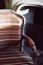 Vintage striped chair in fire place