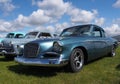 Vintage Studebaker With Other Automobiles Parked In Field Royalty Free Stock Photo