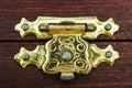 Close-up brass latch lock on a wooden old box Royalty Free Stock Photo