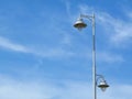 Vintage style bright white street lamp. blue sky background Royalty Free Stock Photo