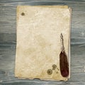 Vintage style fountain feathers pen with sheets of old aged yellow brown faded paper Royalty Free Stock Photo