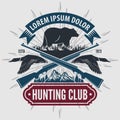 Vintage style hunt club logo with hunting rifles.