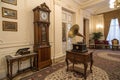 Classical interior with grandfather clock and gramophone Royalty Free Stock Photo