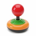 Vintage-style joystick with colorful base and red top button Royalty Free Stock Photo