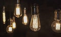 Vintage style light bulbs hanging from the ceiling. Old Edison bulb Royalty Free Stock Photo