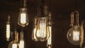 Vintage style light bulbs hanging from the ceiling. Old Edison bulb Royalty Free Stock Photo