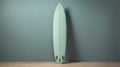 Vintage Style Light Green Surfboard Against Light Blue Wall Royalty Free Stock Photo