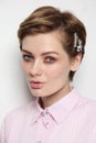 Vintage style portrait of beautiful woman with fancy hairpins in her hair Royalty Free Stock Photo