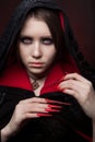 Vintage style portrait of young beautiful vampire woman with gothic Halloween makeup Royalty Free Stock Photo