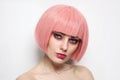 Vintage style portrait of beautiful woman with pink hair and fancy glitter makeup