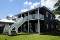 Vintage style queenslander home with centre staircase