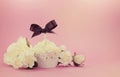 Vintage style retro filter white cupcake with floral decoration