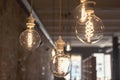Vintage style round light bulbs hanging from the ceiling Royalty Free Stock Photo