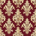 Vintage-style seamless pattern with ornate damask motifs in deep red and gold, suitable for luxury wallpapers or elegant Royalty Free Stock Photo