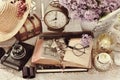 Vintage style still life with old photographs and camera in sepia Royalty Free Stock Photo