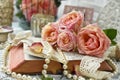 Vintage style still life with roses and old book Royalty Free Stock Photo