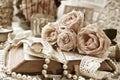 Vintage style still life with roses and old book in sepia Royalty Free Stock Photo