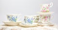 Attractive fine bone china tea cups on light background Royalty Free Stock Photo