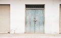 Vintage wall and sky blue wooden door, old Indian house Royalty Free Stock Photo