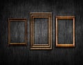 Vintage style wood framework over old black wall background. Space for text. 3d illustration Royalty Free Stock Photo