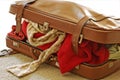 Overstuffed vintage leather suitcase