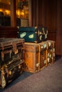 Vintage Suitcases and Trunks In the Lobby of a Luxury Hotel in Europe Royalty Free Stock Photo