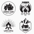 Vintage summer camp logo set. Camping badges and outdoor adventure emblems. Original typography with camping tent, bonfire. Royalty Free Stock Photo