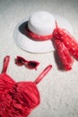 Vintage summer hat, red sunglasses and swimsuit. Royalty Free Stock Photo