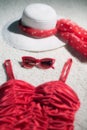 Vintage summer hat, red sunglasses and swimsuit. Royalty Free Stock Photo