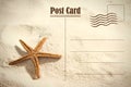 Vintage summer postcard. Starfish on white sand, for summer background with copy space