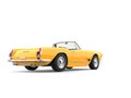 Vintage sun yellow convertible cabriolet car - back view Royalty Free Stock Photo