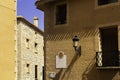 Vintage sundial clock on the old house wall at the Old Town street in Relleu, Spain Royalty Free Stock Photo