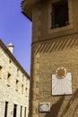 Vintage sundial clock on the old house wall at the Old Town street in Relleu, Spain Royalty Free Stock Photo