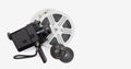 Vintage super 8 camera and film reels on gray background Royalty Free Stock Photo