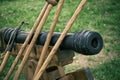 Vintage swedish cannons and metal cannonballs. Ancient military arsenal of the events of the Russian-Swedish war Royalty Free Stock Photo