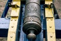 Vintage swedish cannons and metal cannonballs. Ancient military arsenal of the events of the Russian-Swedish war