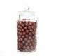Vintage sweet shop jar full of retro aniseed ball sweets Royalty Free Stock Photo