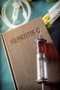 Vintage Syringe On A Book Of hepatitis C Royalty Free Stock Photo