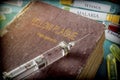 Vintage Syringe On A Book Of yellow plague