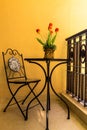 Vintage table and chair on relaxing terrace.