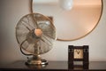 Vintage table fan and clock