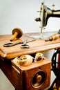 Vintage tailor`s tools on old sewing machine