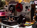 Vintage tape players, tube amplifier, headphones on stand, vinyl records at the international exhibition HI-FI & HIGH END SHOW