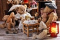 Vintage teddy bear family sitting at the tea table Royalty Free Stock Photo
