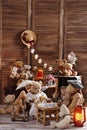 Vintage teddy bear family sitting at the tea table Royalty Free Stock Photo