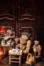 Vintage teddy bear family sitting at the tea table Royalty Free Stock Photo